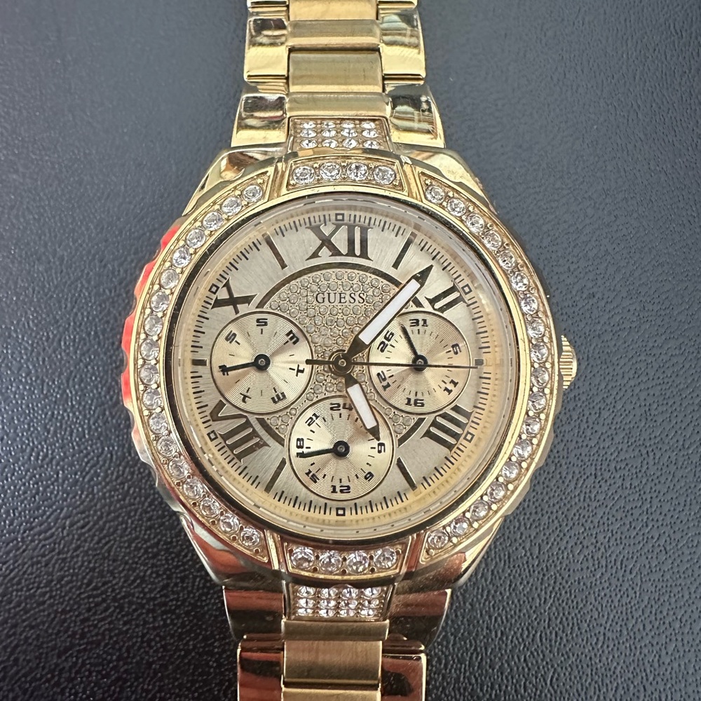 Gold guess watch